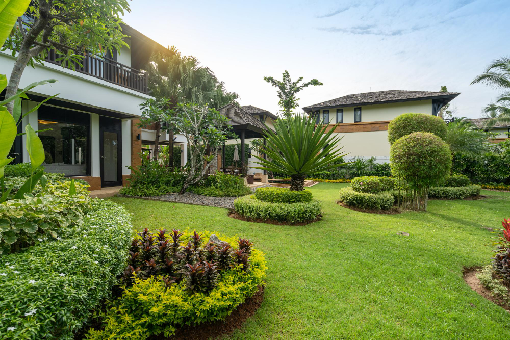 Landscaping Springvale with lush lawns, flower beds, and decorative pathways